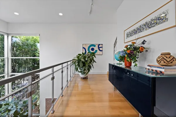 a view of a workspace with furniture and front door