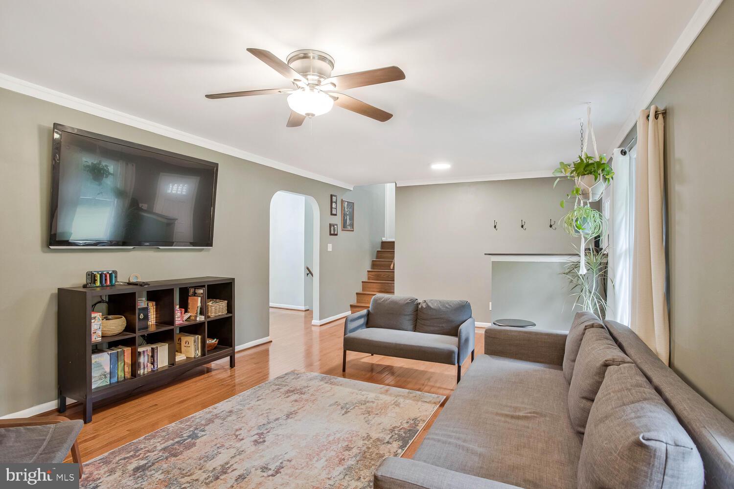 1110 Cox Road Huntingtown, MD 20639 - Photo 4 of 20 a living room with furniture and a flat screen tv