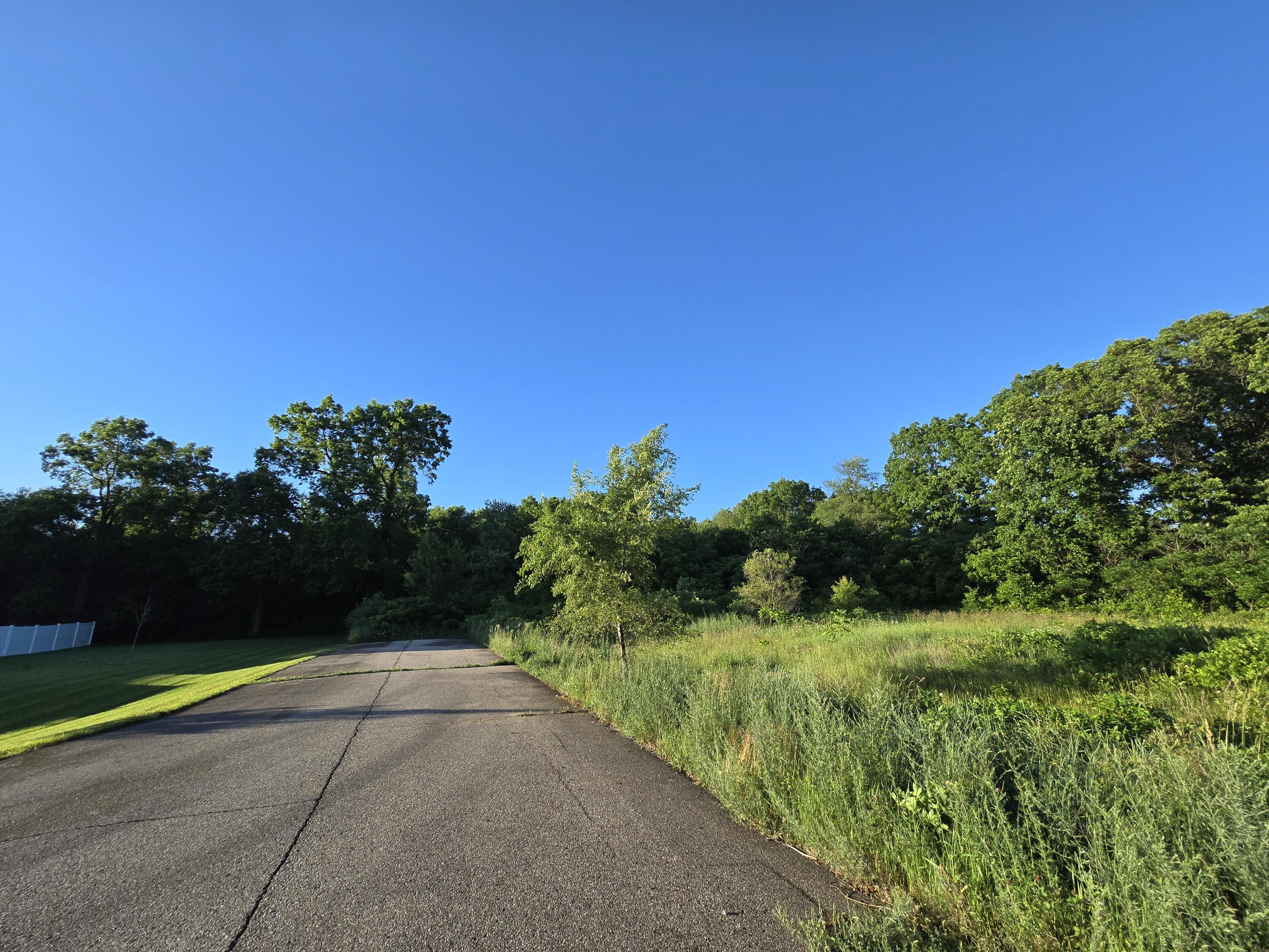 10 Embassy Road Edwardsburg, MI 49112 - Photo 1 of 2 Homesite is on the Right