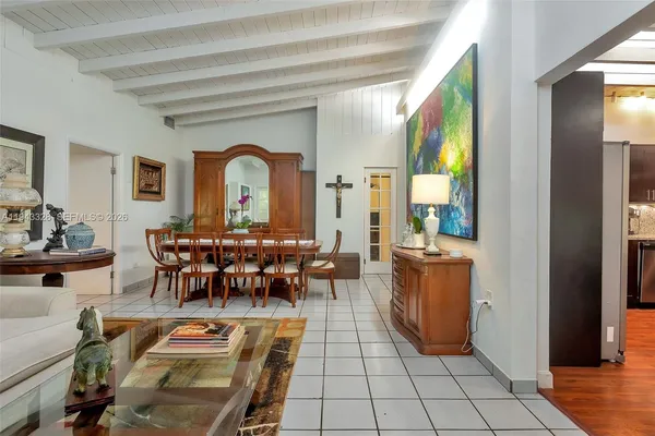 a view of a livingroom with furniture and window