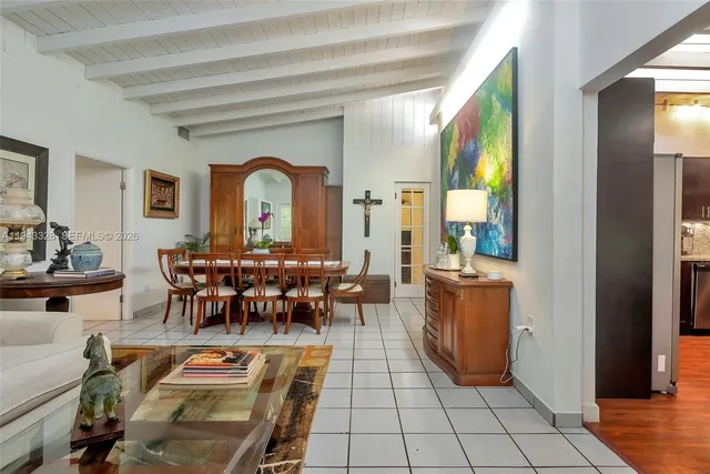 a view of a livingroom with furniture and window