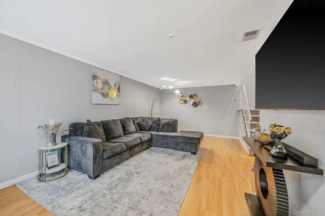 a living room with furniture and a couch