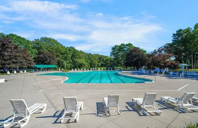 a view of an outdoor space and tennis court