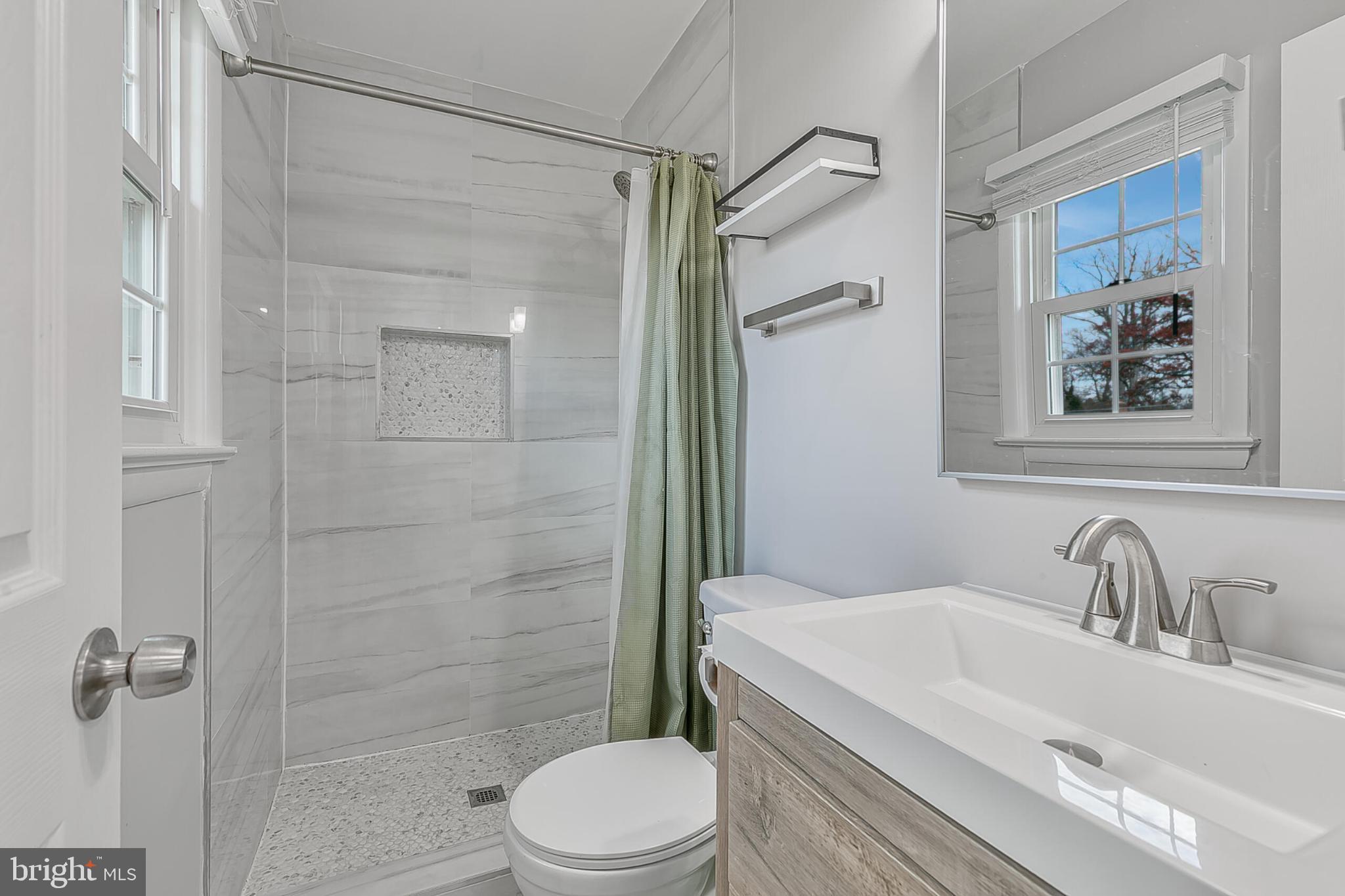 3419 Ramsgate Terrace Alexandria, VA 22309 - Photo 23 of 36 Modern bathroom with sleek finishes.