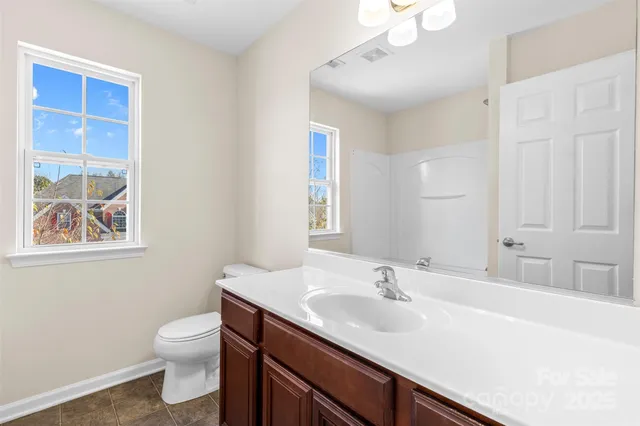 a bathroom with a sink and a toilet
