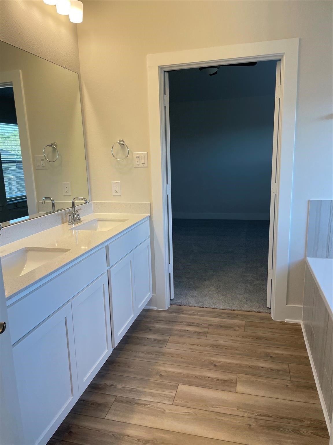 10638 Whitejacket Conroe, TX 77385 - Photo 8 of 25 a bathroom with a sink and a mirror