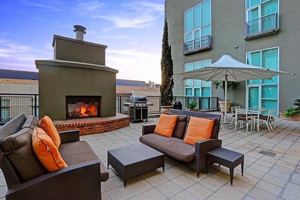 2000 Bagby Street, Unit 13432 Houston, TX 77002 - Photo 21 of 27 a outdoor space with patio fireplace and a couch