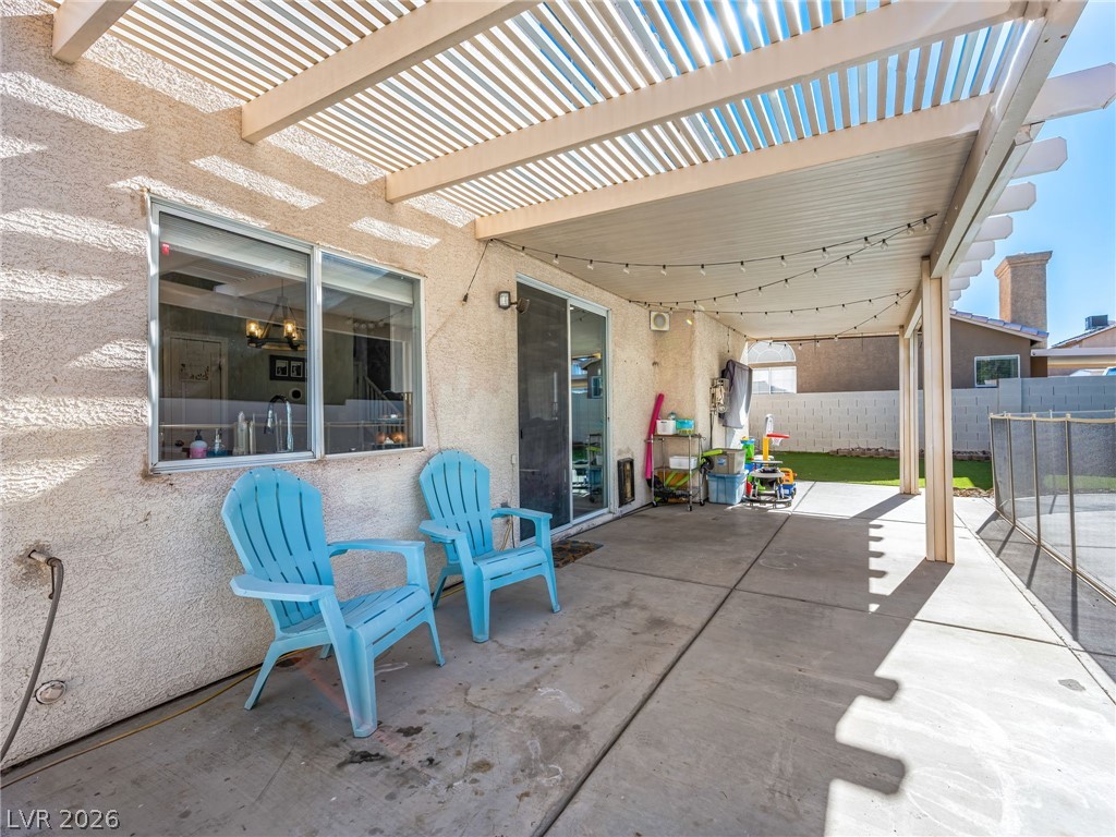 2199 Maple Shade Street Henderson, NV 89002 - Photo 43 of 75 Resurfaced pool with all-new fencing, surrounded by artificial turf for year-round greenery. Fenced backyard includes a shed, large covered patio for entertaining and shade, and RV parking with poured concrete and a large RV gate.