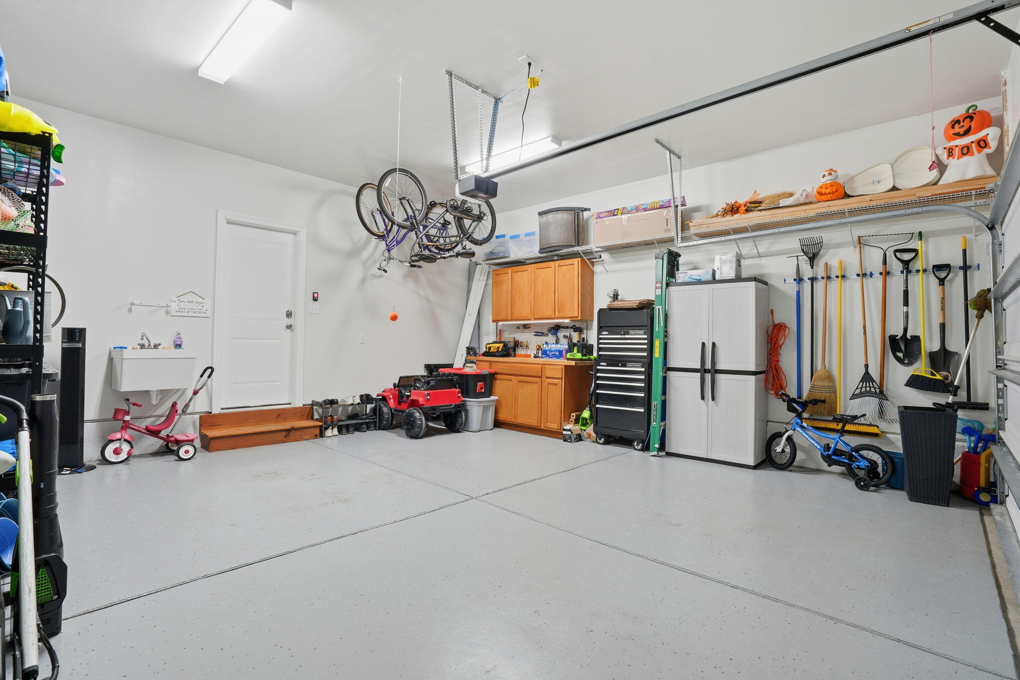 158 Boots Branch Road Summerville, SC 29485 - Photo 35 of 49 Garage: epoxy floors and work bench!