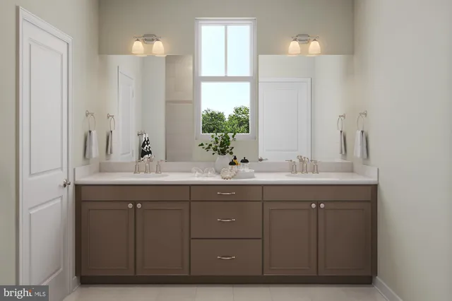 a bathroom with a double vanity sink and a mirror