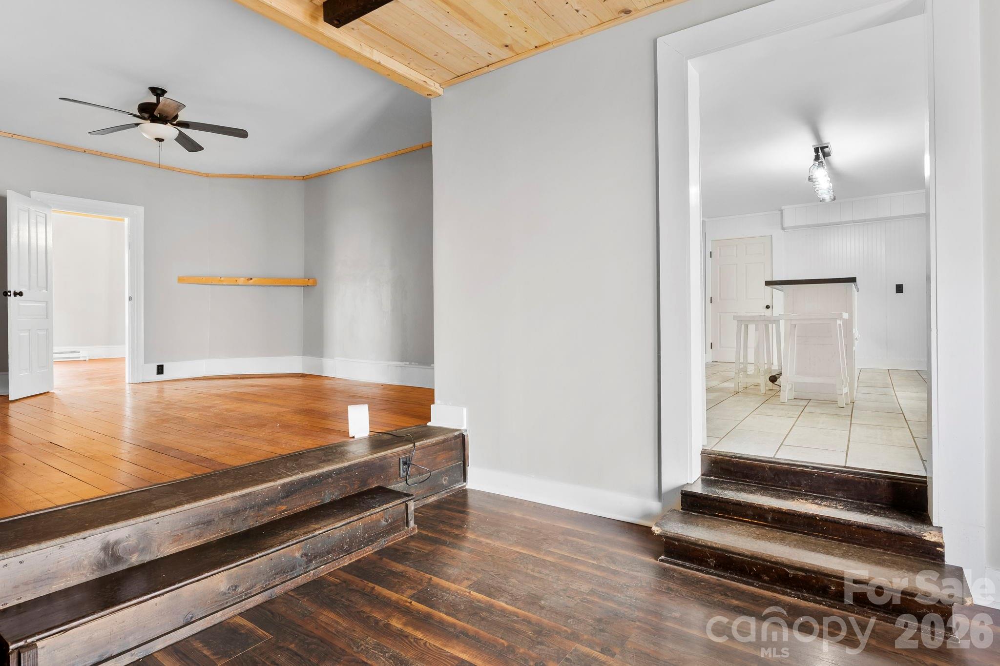 42 Old Patton Hill Road Swannanoa, NC 28778 - Photo 13 of 33 a pool table with white walls and wooden floor