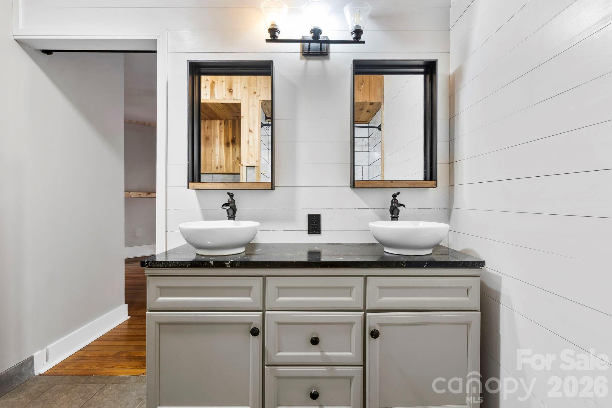 42 Old Patton Hill Road Swannanoa, NC 28778 - Photo 16 of 33 a bathroom with a sink and a mirror