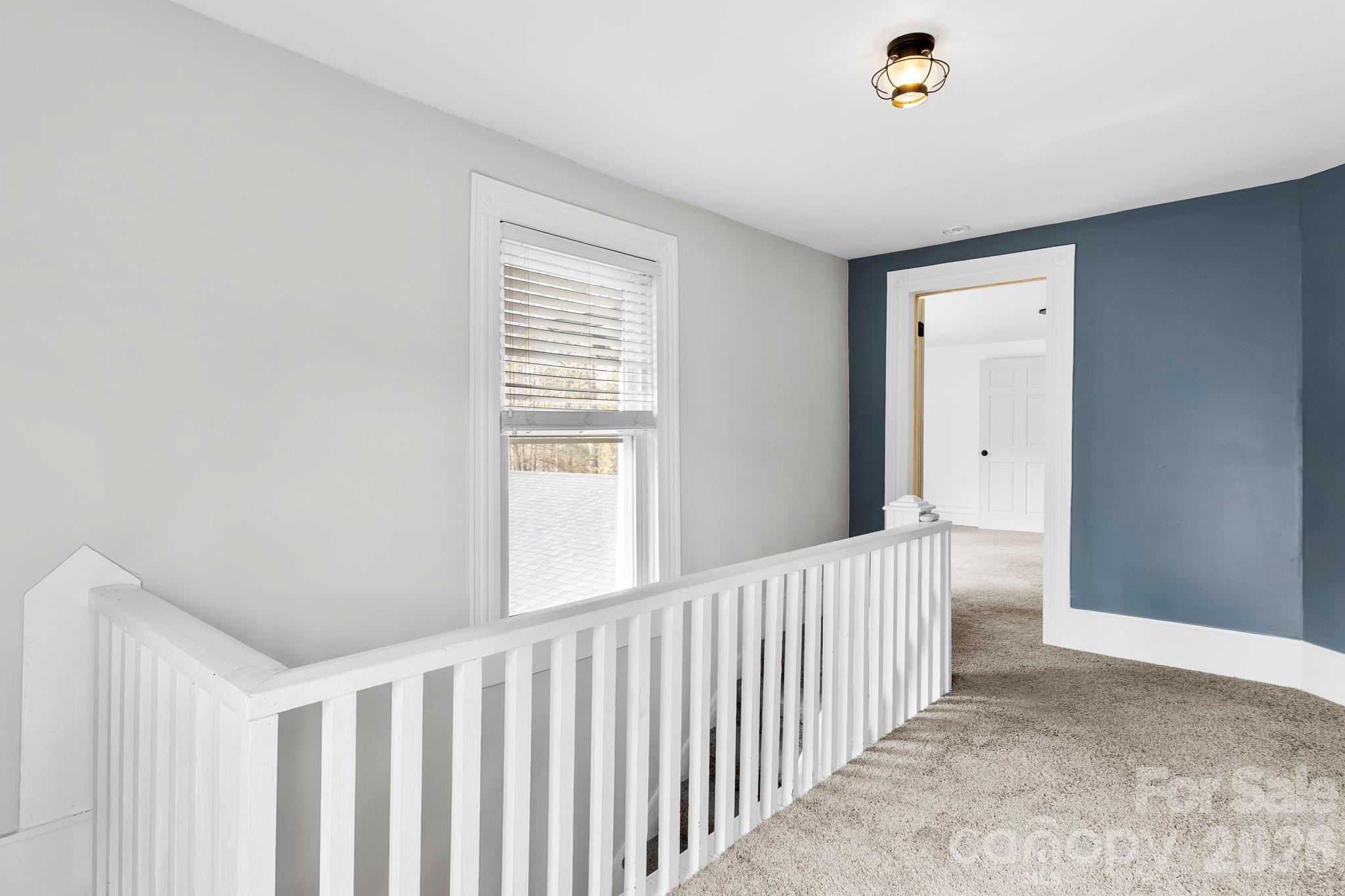 42 Old Patton Hill Road Swannanoa, NC 28778 - Photo 17 of 33 a view of a hallway to a window and a livingroom