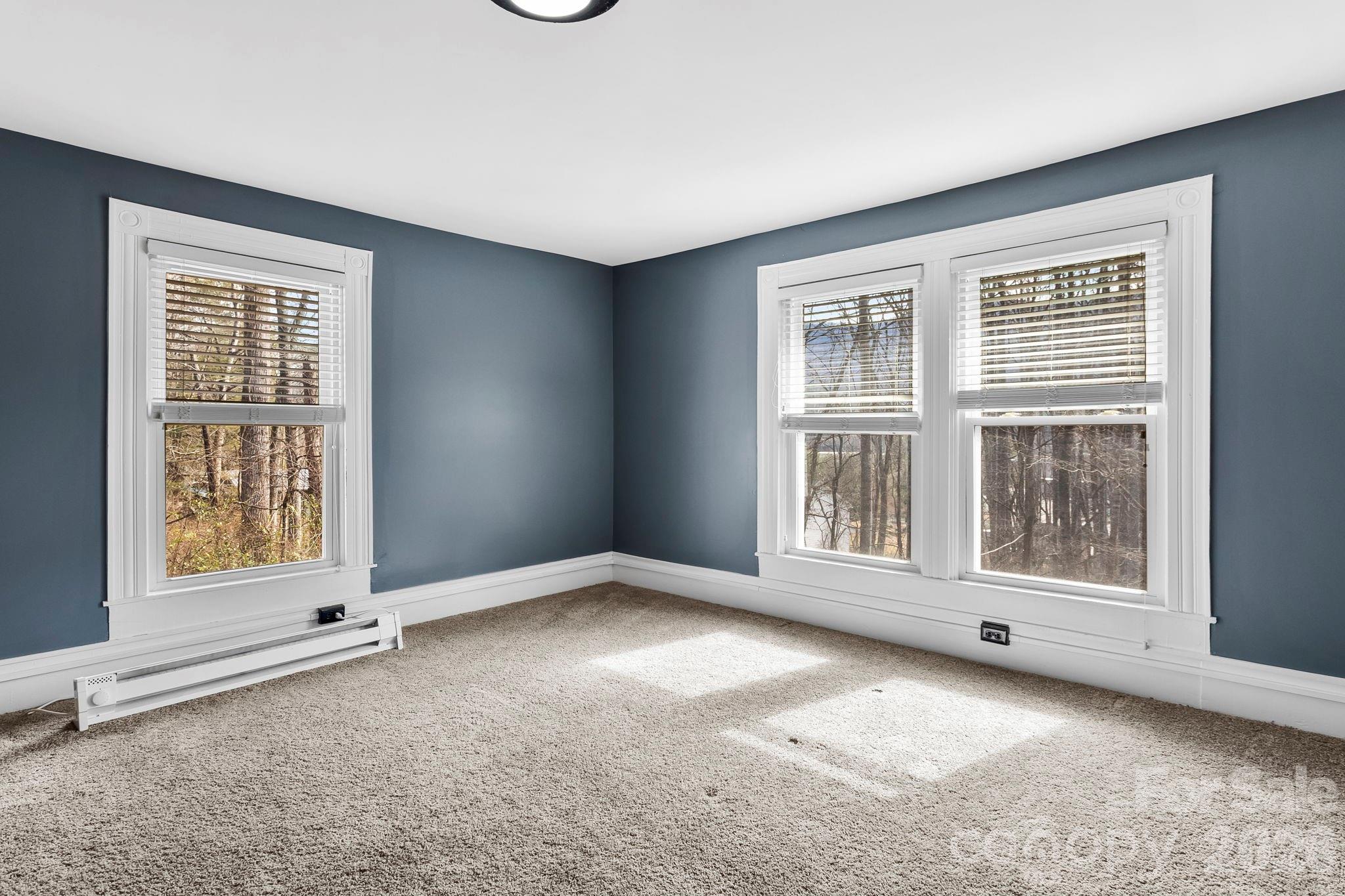 42 Old Patton Hill Road Swannanoa, NC 28778 - Photo 18 of 33 an empty room with windows