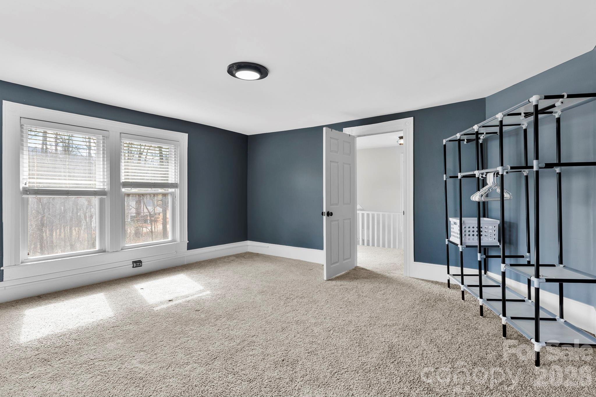 42 Old Patton Hill Road Swannanoa, NC 28778 - Photo 19 of 33 a view of an empty room with a window