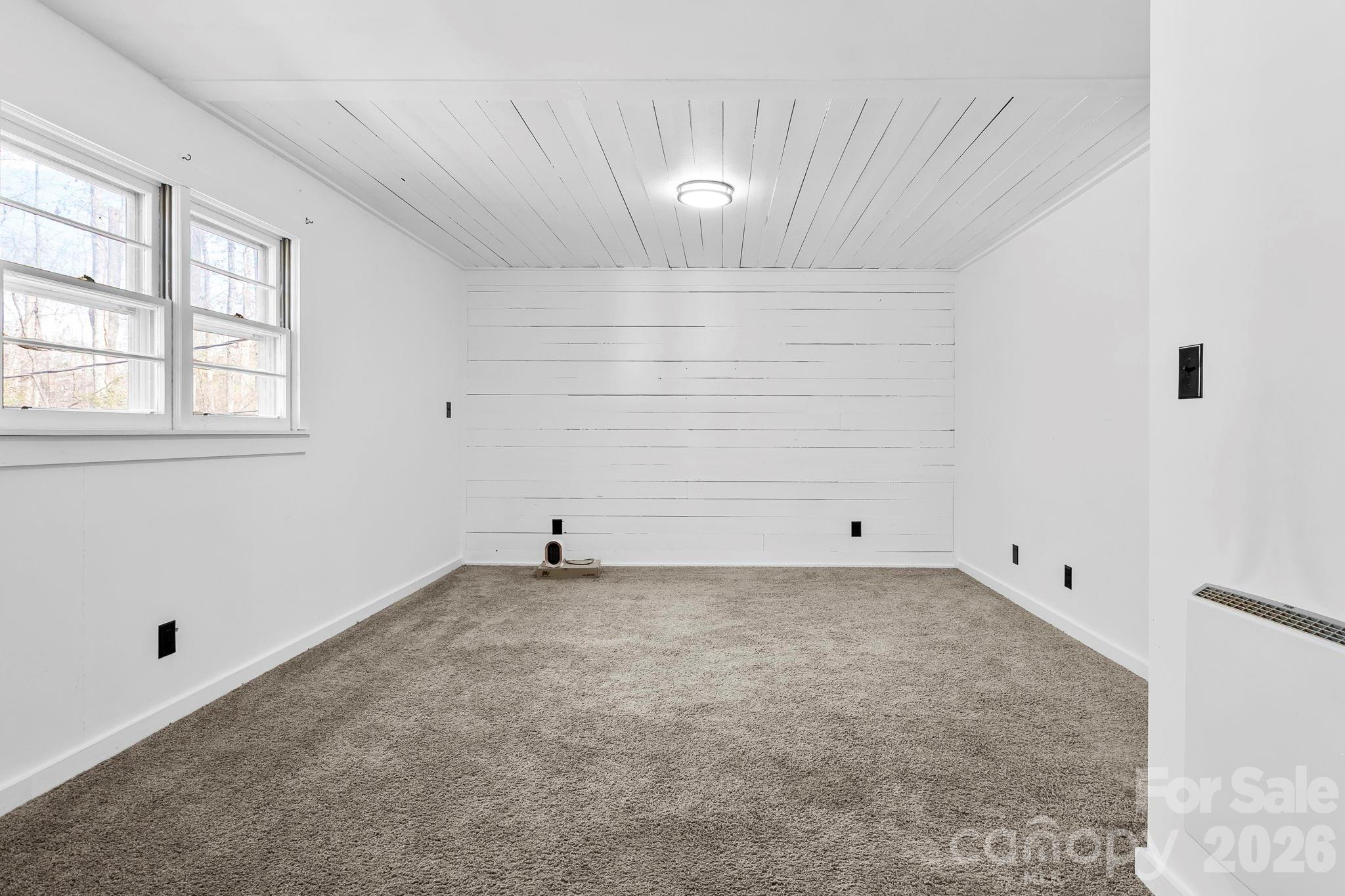 42 Old Patton Hill Road Swannanoa, NC 28778 - Photo 25 of 33 a view of an empty room and a window