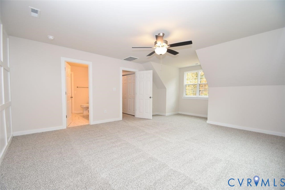 375 Amick Road Louisa, VA 23093 - Photo 22 of 25 an empty room with windows and fan