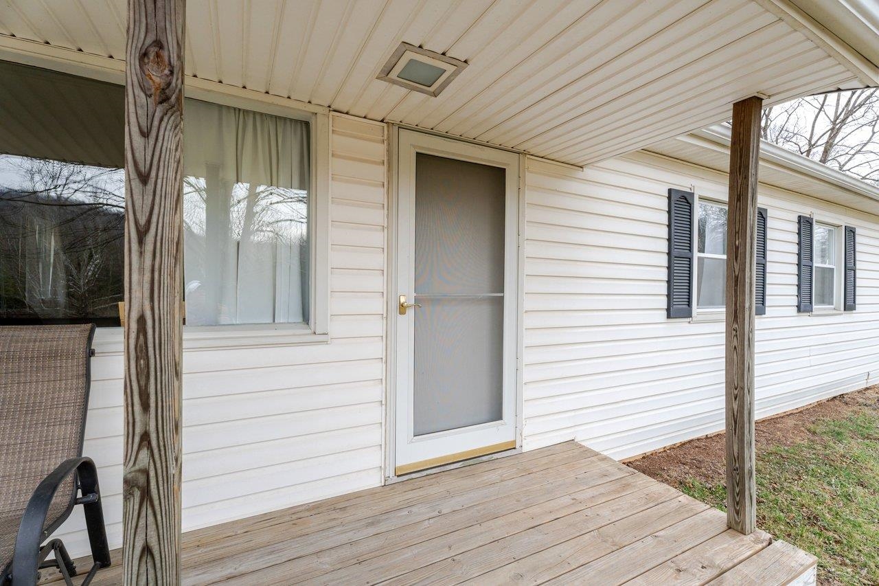 11918 Turleytown Road Broadway, VA 22815 - Photo 33 of 42 a view of a porch with wooden floor and a ceiling fan