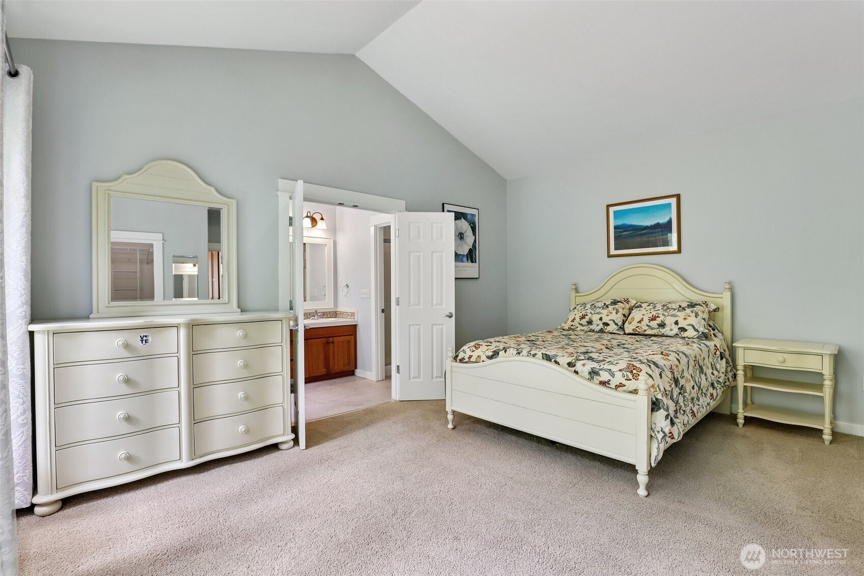19709 Southeast 26th Way Camas, WA 98607 - Photo 24 of 36 a spacious bedroom with a bed and a dresser