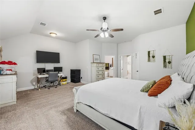 a bathroom with a double vanity sink a mirror and a shower
