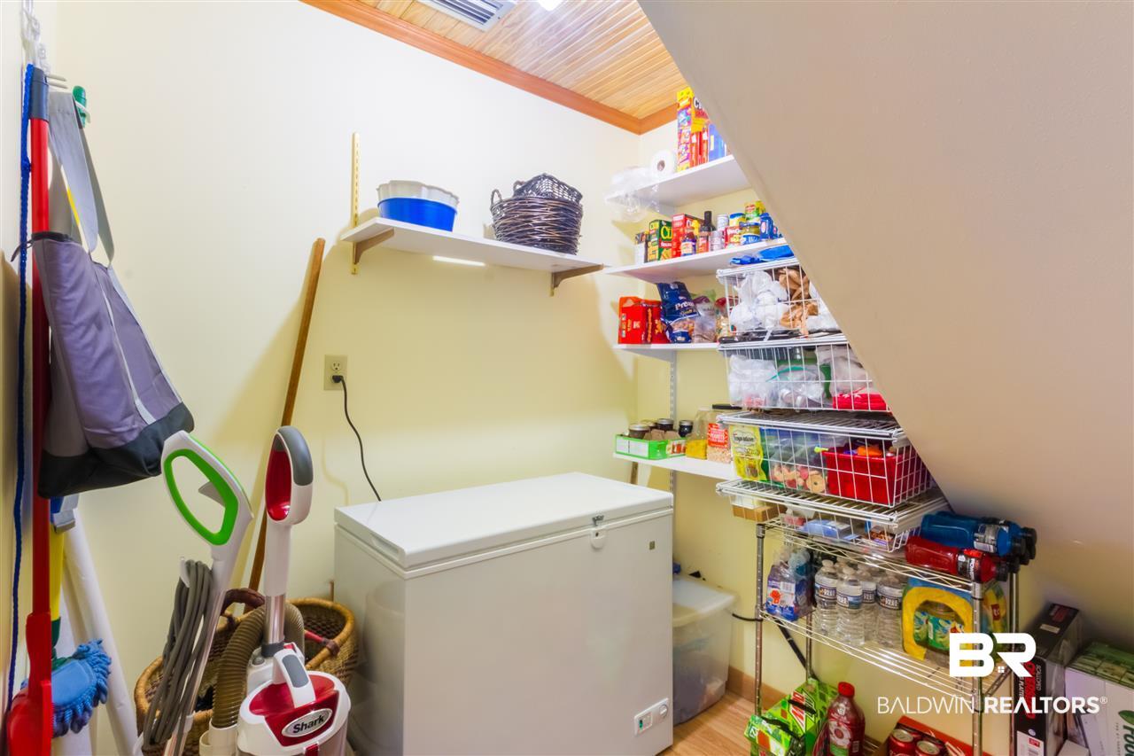 29600 Loper Road Loxley, AL 36551 - Photo 21 of 29 Storage/pantry under stairs