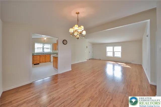 a view of livingroom with window and wooden floor