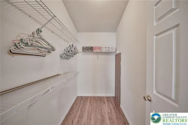 a view of a storage & utility room with a window