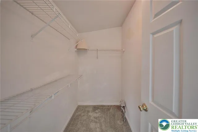 a view of small space with racks on the wall