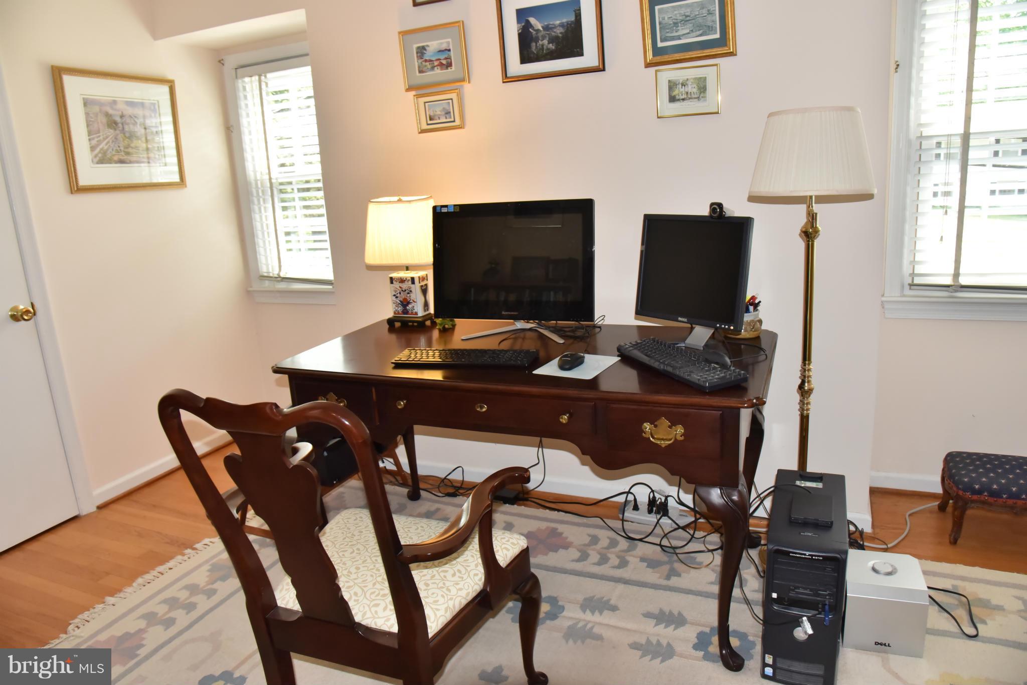 3821 King Arthur Road Annandale, VA 22003 - Photo 11 of 30 a view of a workspace with furniture and a window