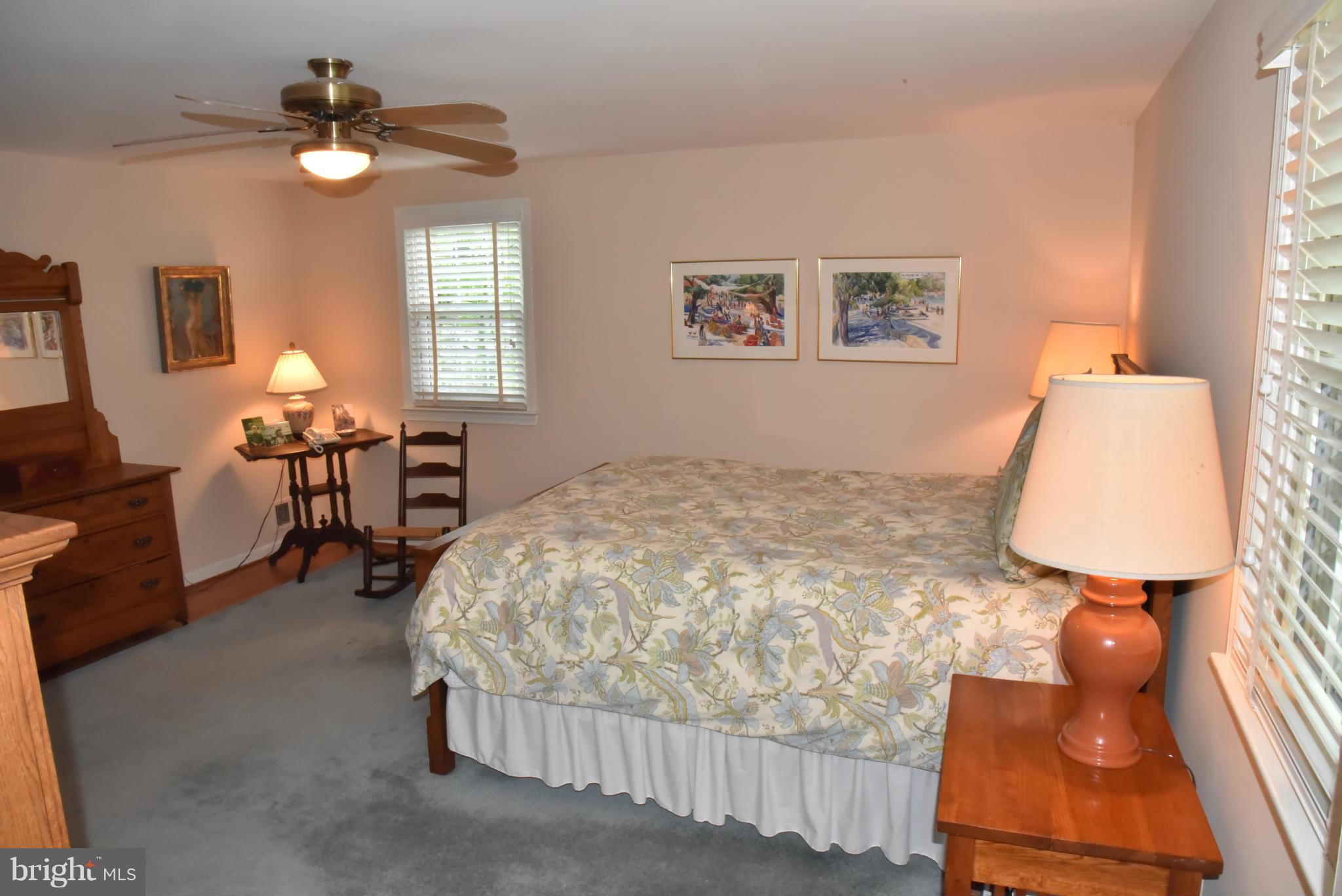 3821 King Arthur Road Annandale, VA 22003 - Photo 18 of 30 a bedroom with a bed and wooden floor