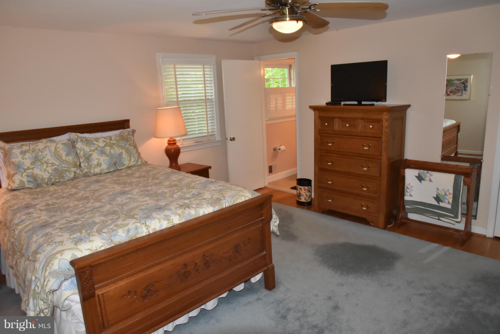 3821 King Arthur Road Annandale, VA 22003 - Photo 19 of 30 a bed room with a bed and a television