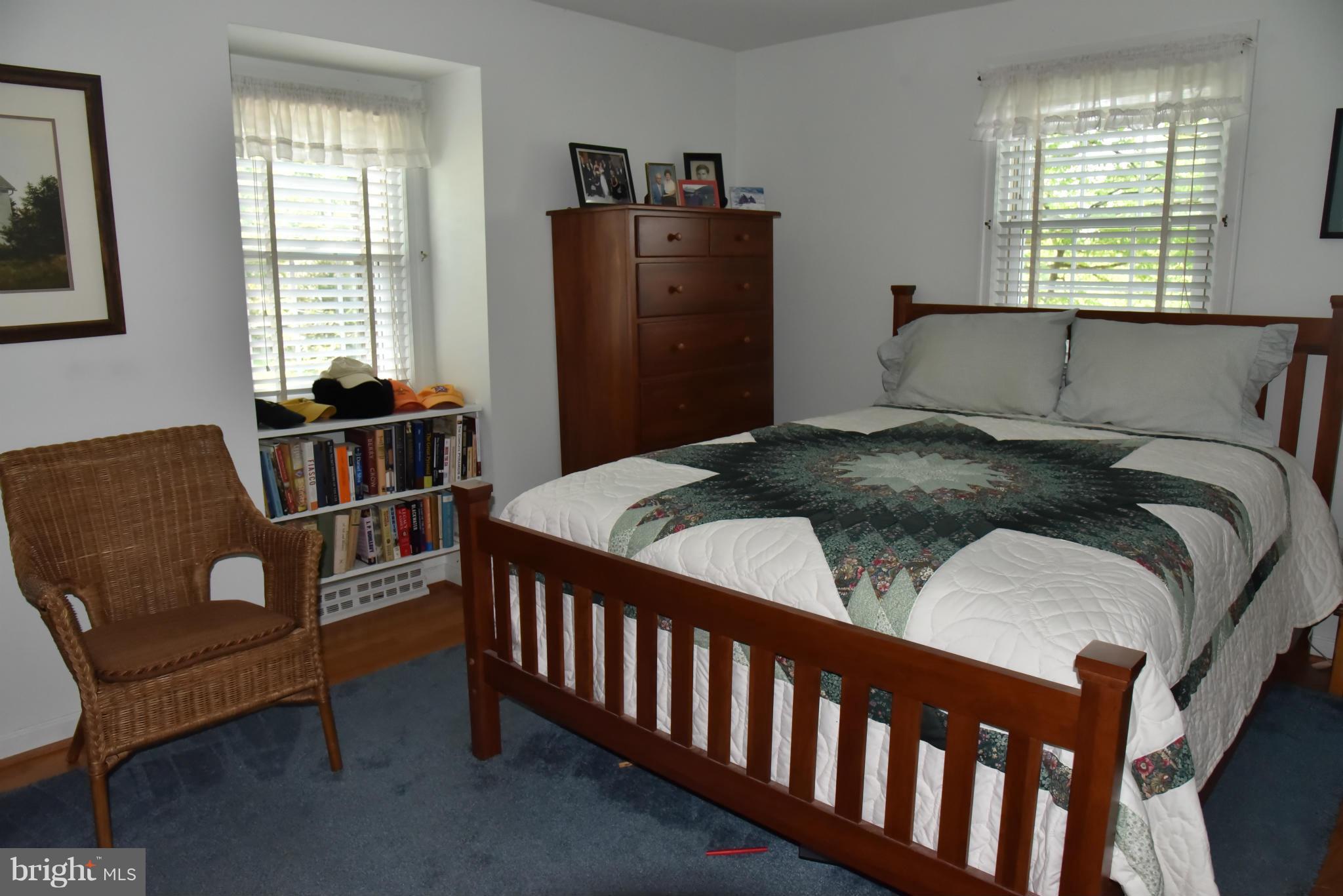 3821 King Arthur Road Annandale, VA 22003 - Photo 21 of 30 a bedroom with a bed and wooden floor