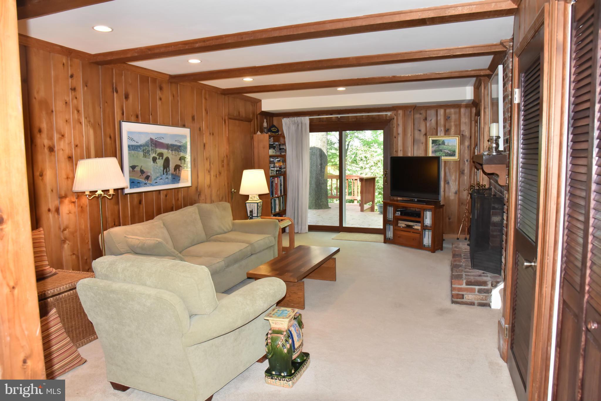 3821 King Arthur Road Annandale, VA 22003 - Photo 23 of 30 a living room with furniture and a flat screen tv