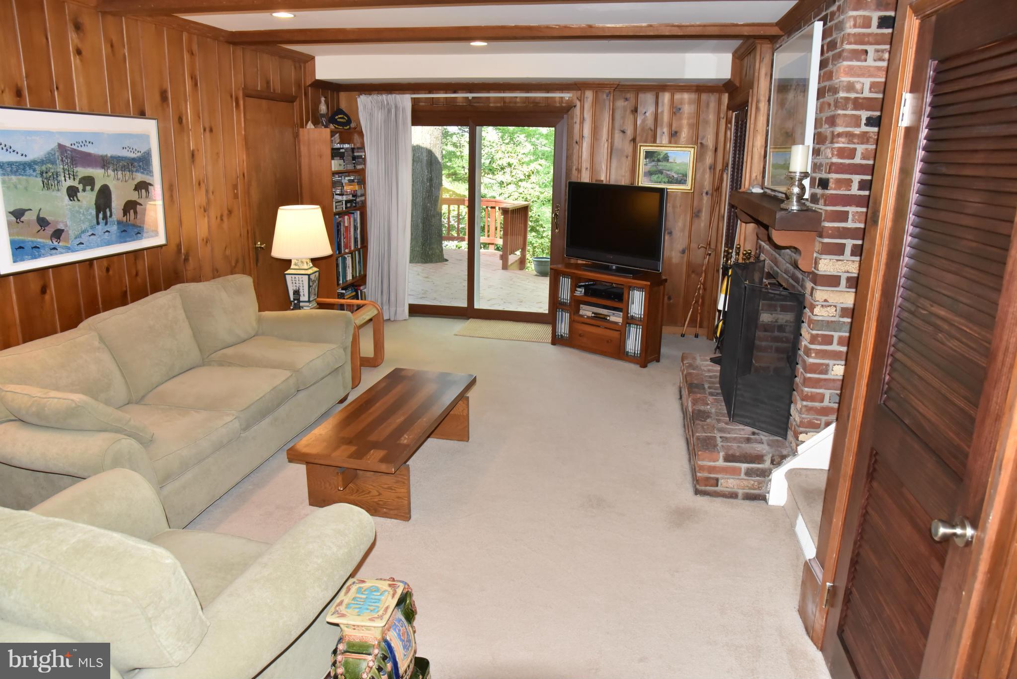 3821 King Arthur Road Annandale, VA 22003 - Photo 24 of 30 a living room with furniture and a flat screen tv