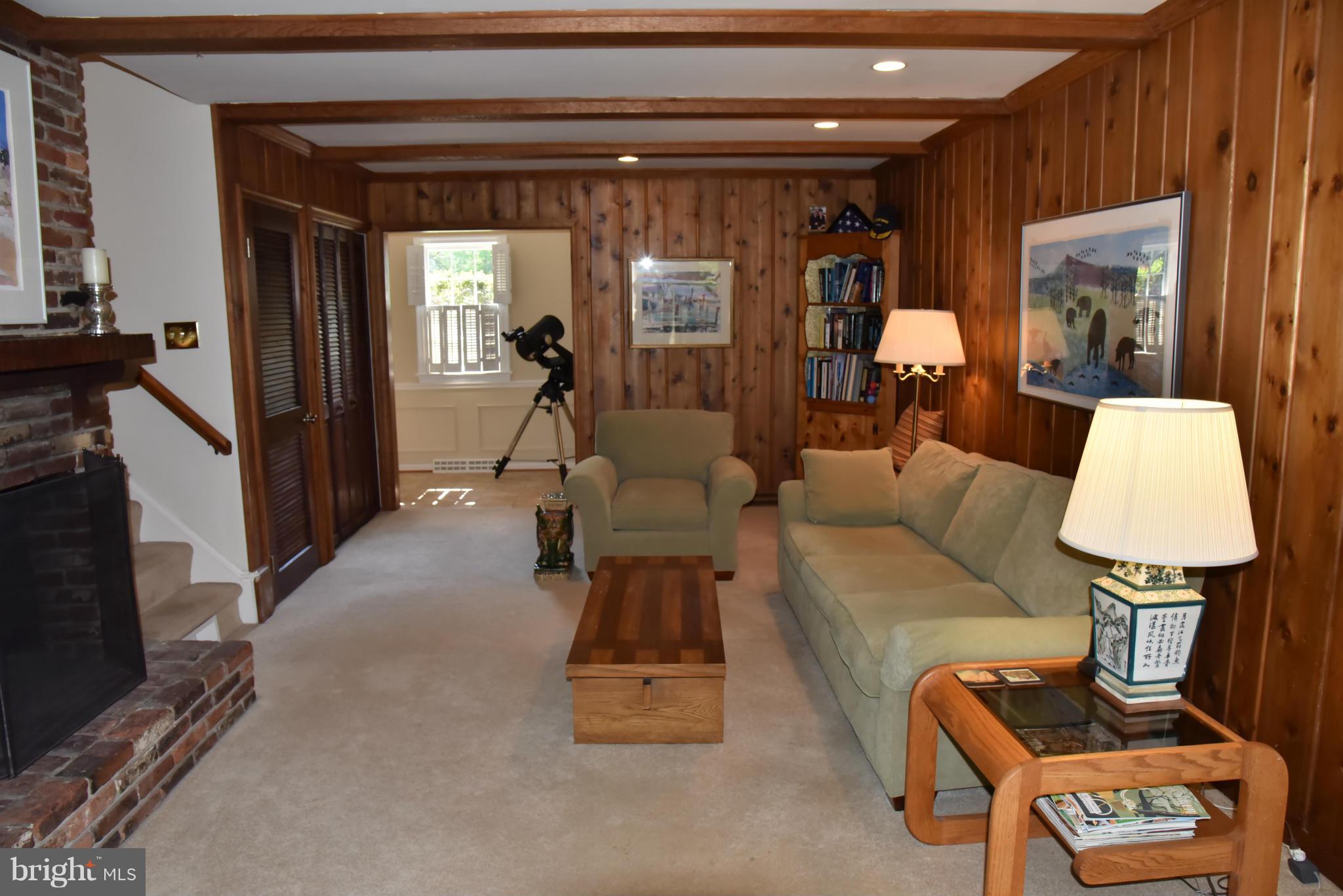 3821 King Arthur Road Annandale, VA 22003 - Photo 25 of 30 a living room with furniture and a lamp