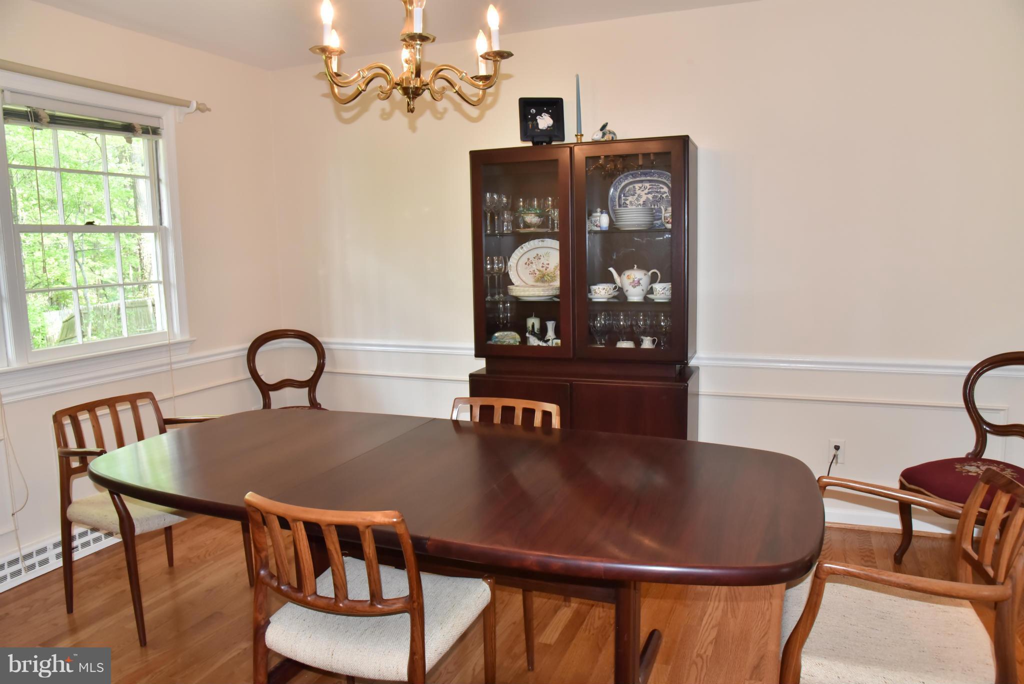 3821 King Arthur Road Annandale, VA 22003 - Photo 8 of 30 a view of a dining room with furniture and chandelier