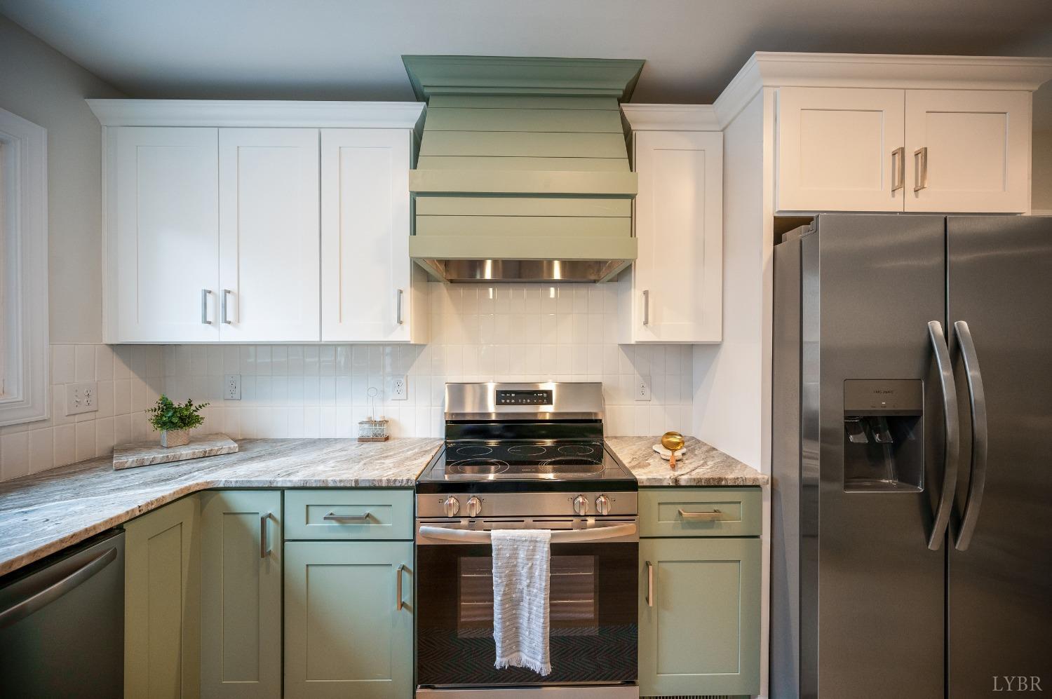 1761 Old Farm Road Lynchburg, VA 24503 - Photo 13 of 60 a kitchen with a stove and a refrigerator