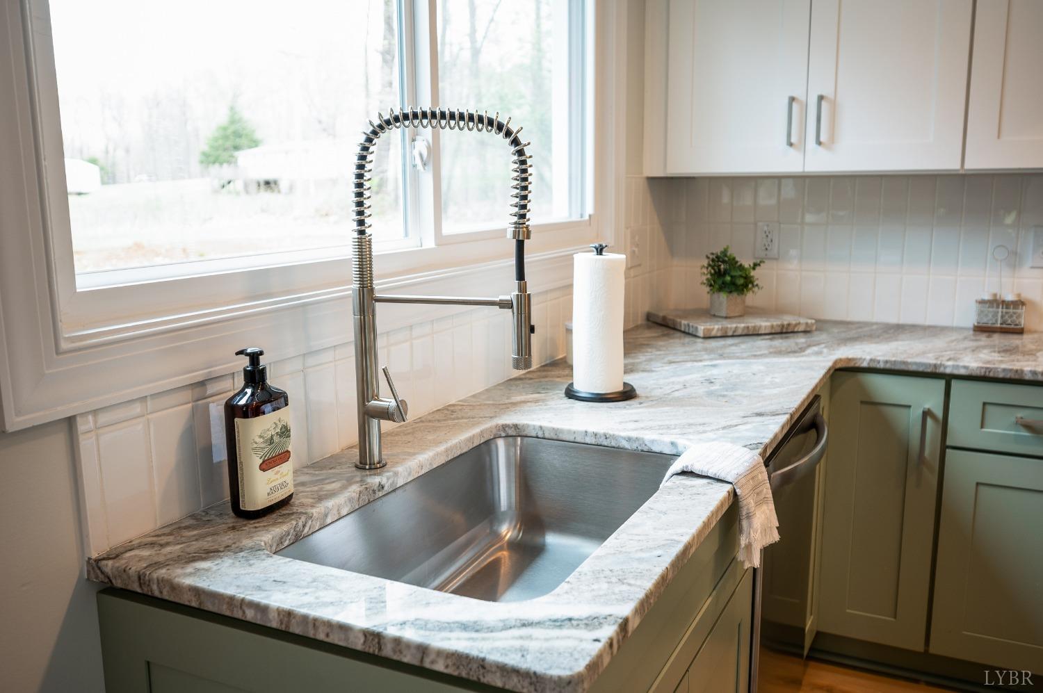 1761 Old Farm Road Lynchburg, VA 24503 - Photo 15 of 60 a kitchen with a granite countertop sink and a granite counter tops
