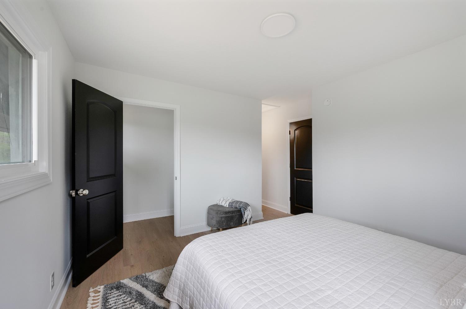 1761 Old Farm Road Lynchburg, VA 24503 - Photo 23 of 60 a bedroom with a bed and a dresser
