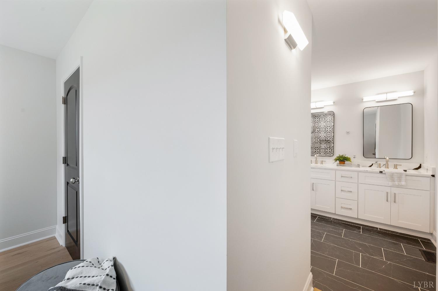 1761 Old Farm Road Lynchburg, VA 24503 - Photo 25 of 60 a bathroom with a sink and a mirror