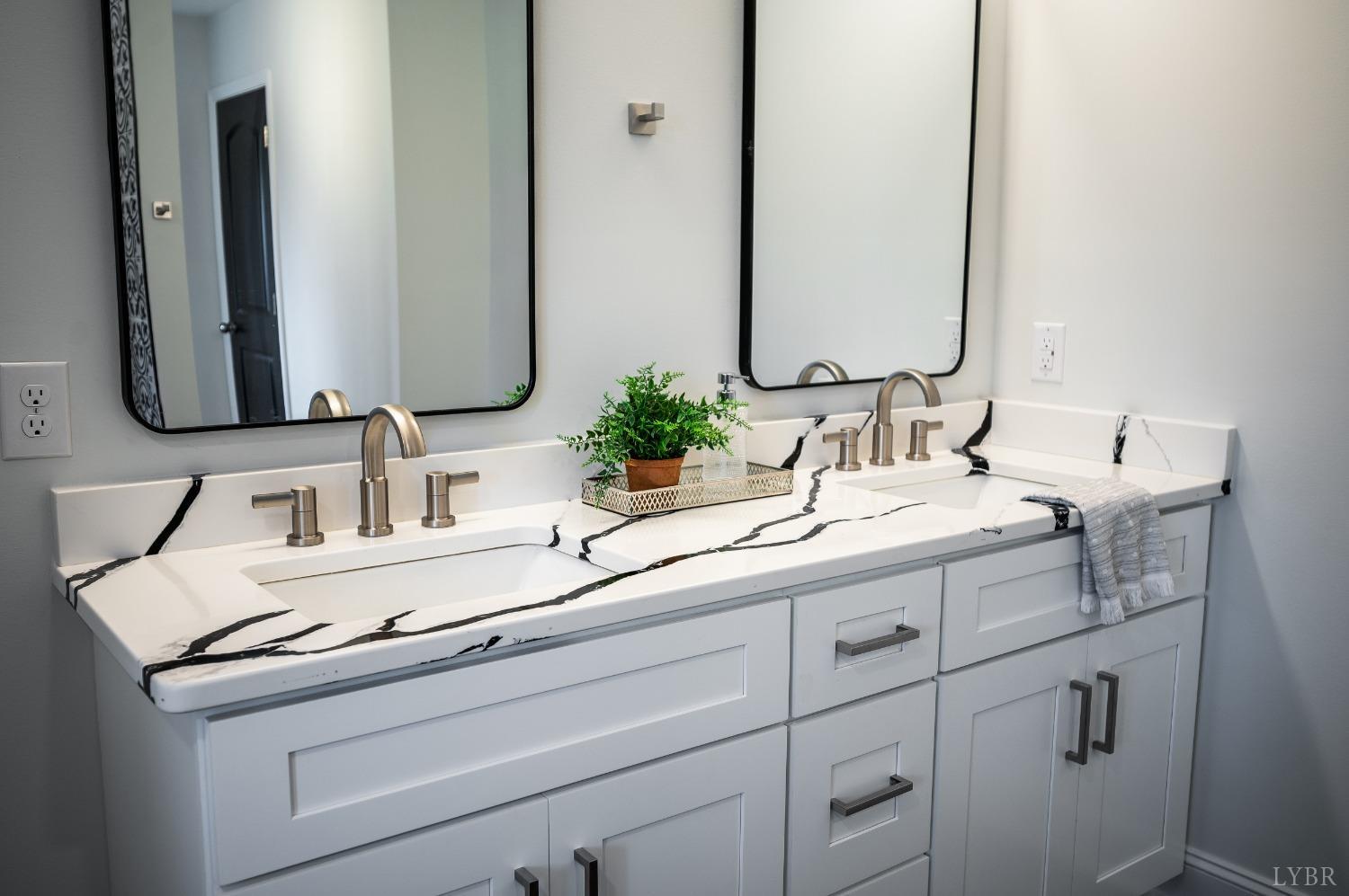 1761 Old Farm Road Lynchburg, VA 24503 - Photo 27 of 60 a bathroom with a sink and a mirror