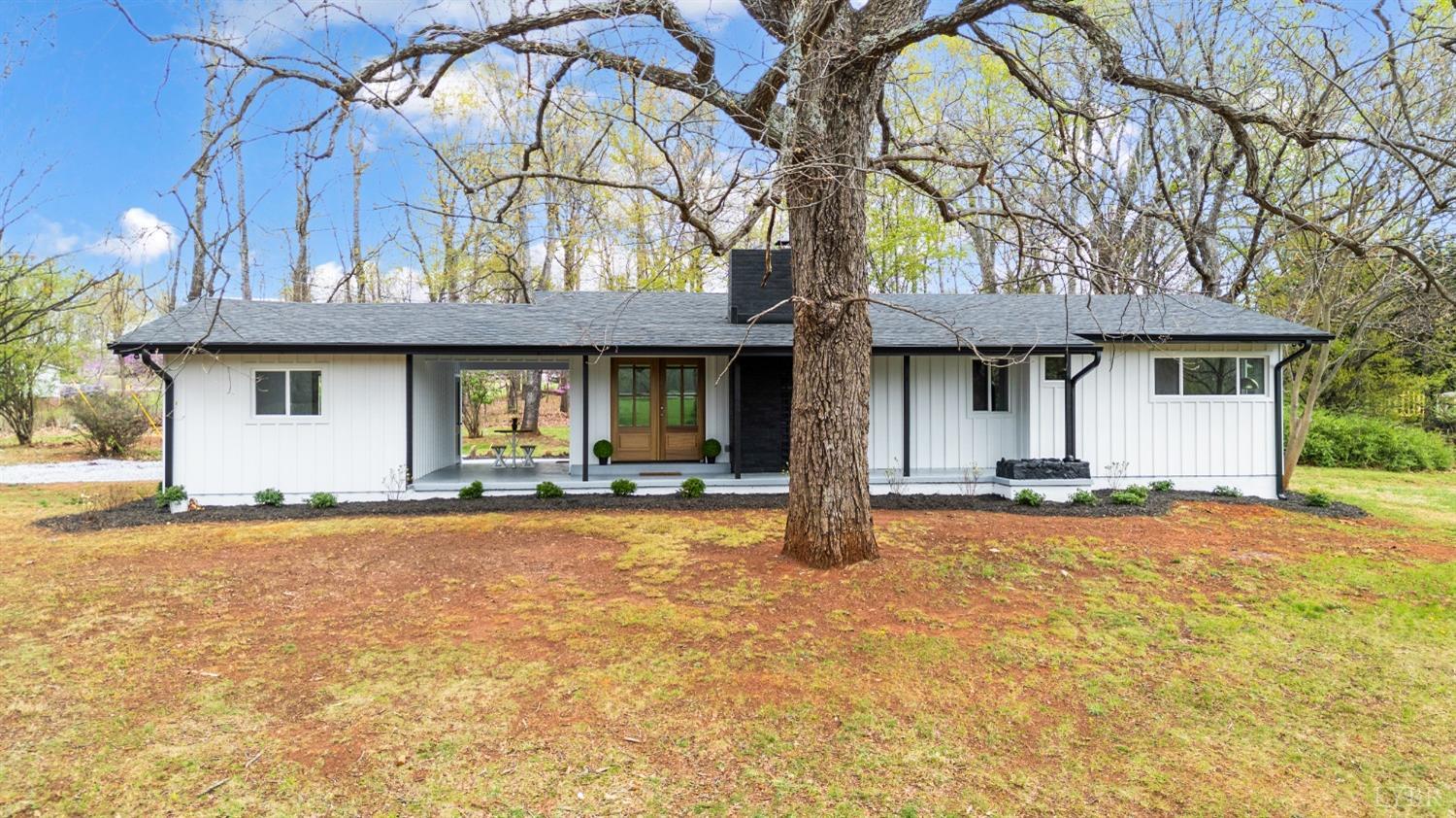 1761 Old Farm Road Lynchburg, VA 24503 - Photo 3 of 60 a view of a house with a patio and a yard