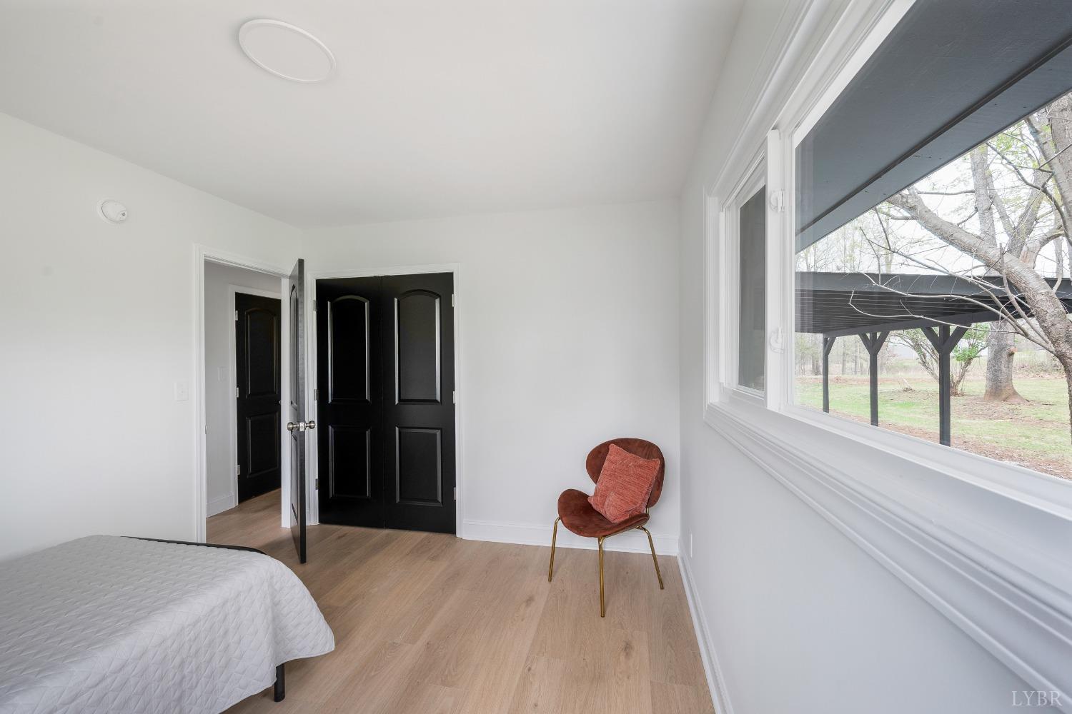 1761 Old Farm Road Lynchburg, VA 24503 - Photo 32 of 60 a bedroom with a bed and a window