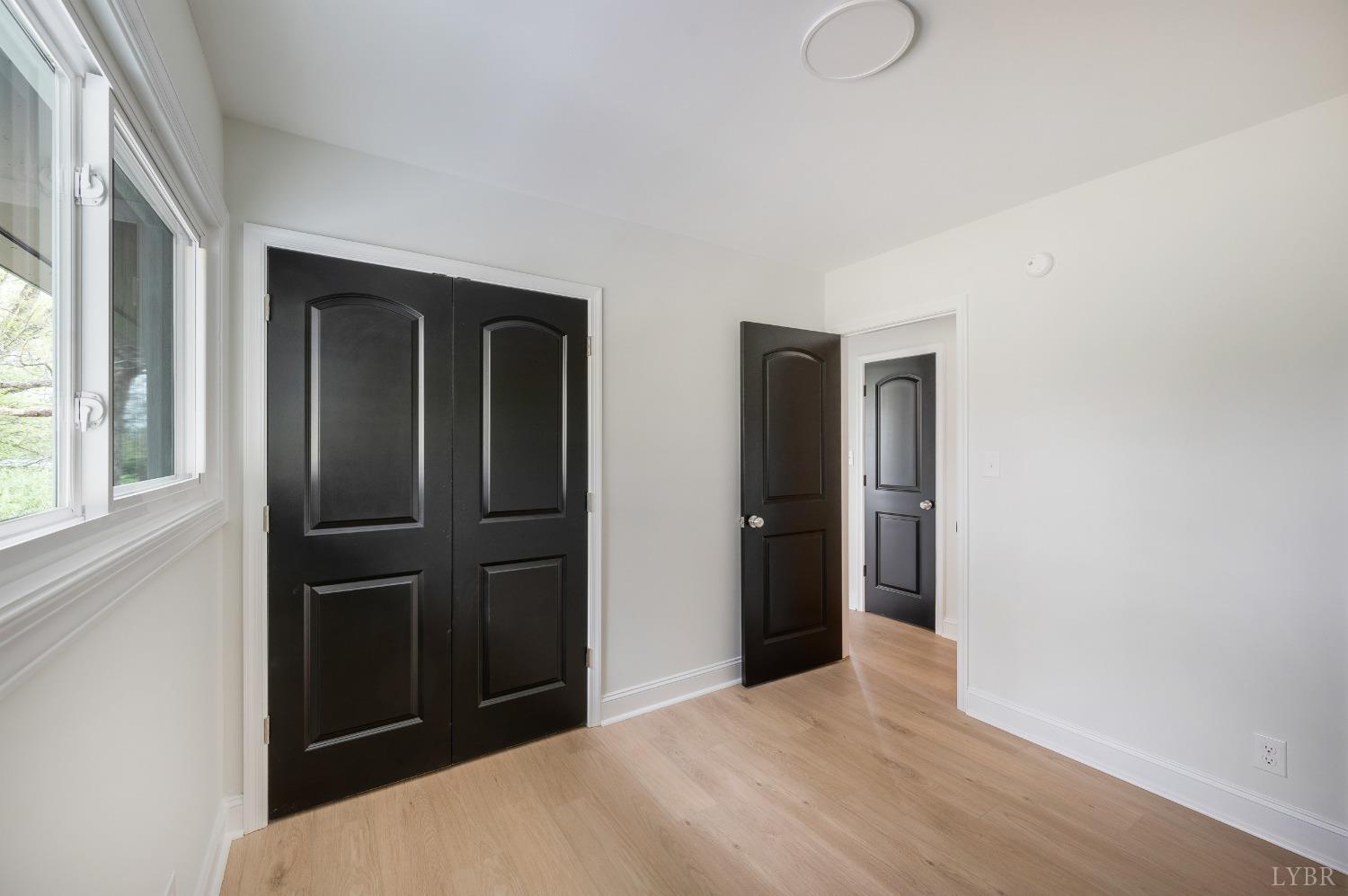 1761 Old Farm Road Lynchburg, VA 24503 - Photo 34 of 60 a bedroom with a bed and a window