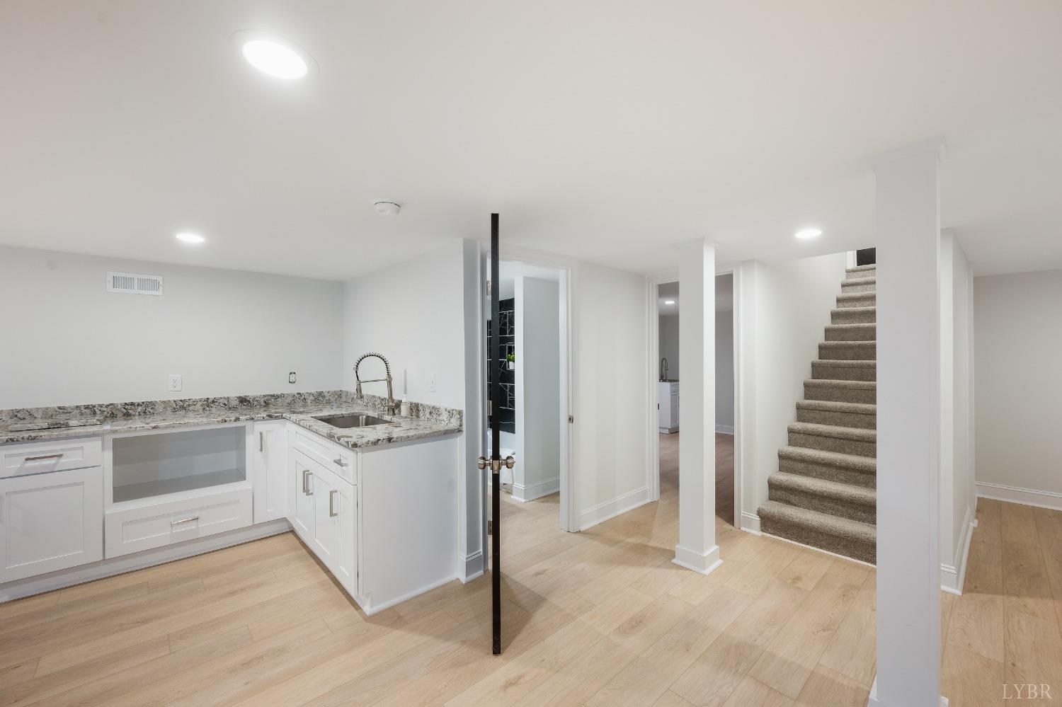 1761 Old Farm Road Lynchburg, VA 24503 - Photo 35 of 60 a kitchen with appliances cabinets and a sink