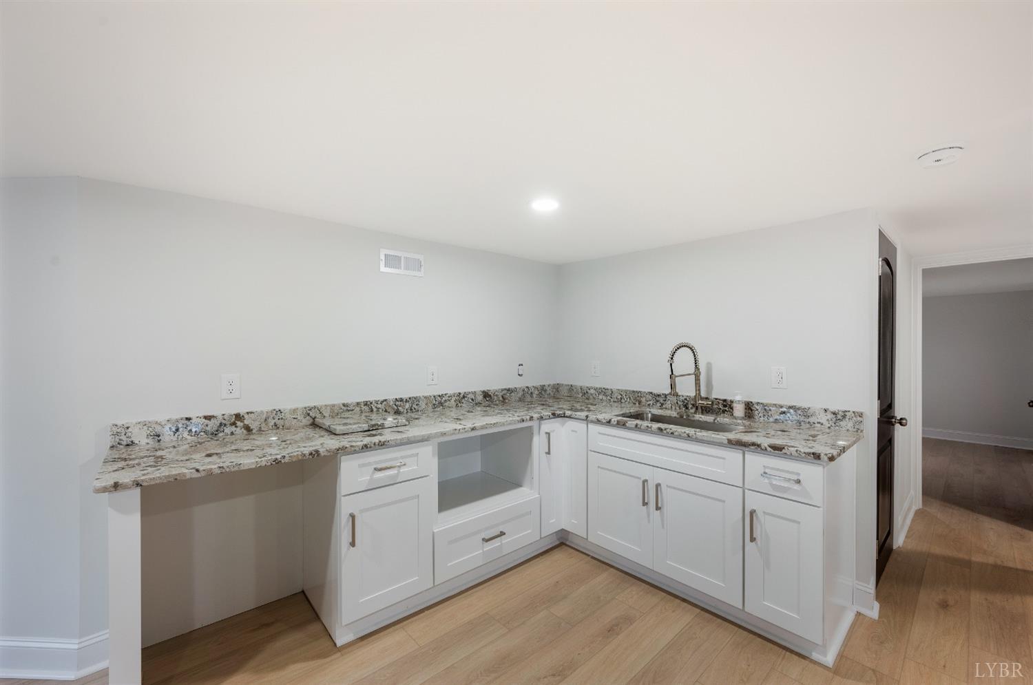1761 Old Farm Road Lynchburg, VA 24503 - Photo 38 of 60 a kitchen with a stove top oven and sink