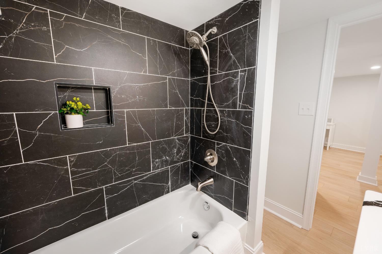 1761 Old Farm Road Lynchburg, VA 24503 - Photo 39 of 60 a bathroom with a bathtub and a shower