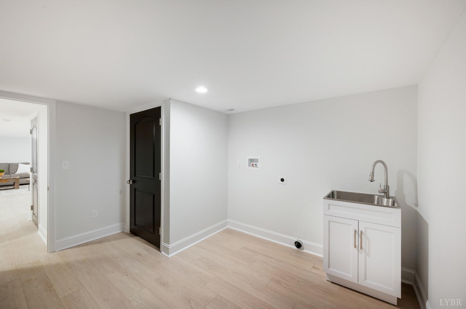 1761 Old Farm Road Lynchburg, VA 24503 - Photo 42 of 60 a bathroom with a sink and a mirror