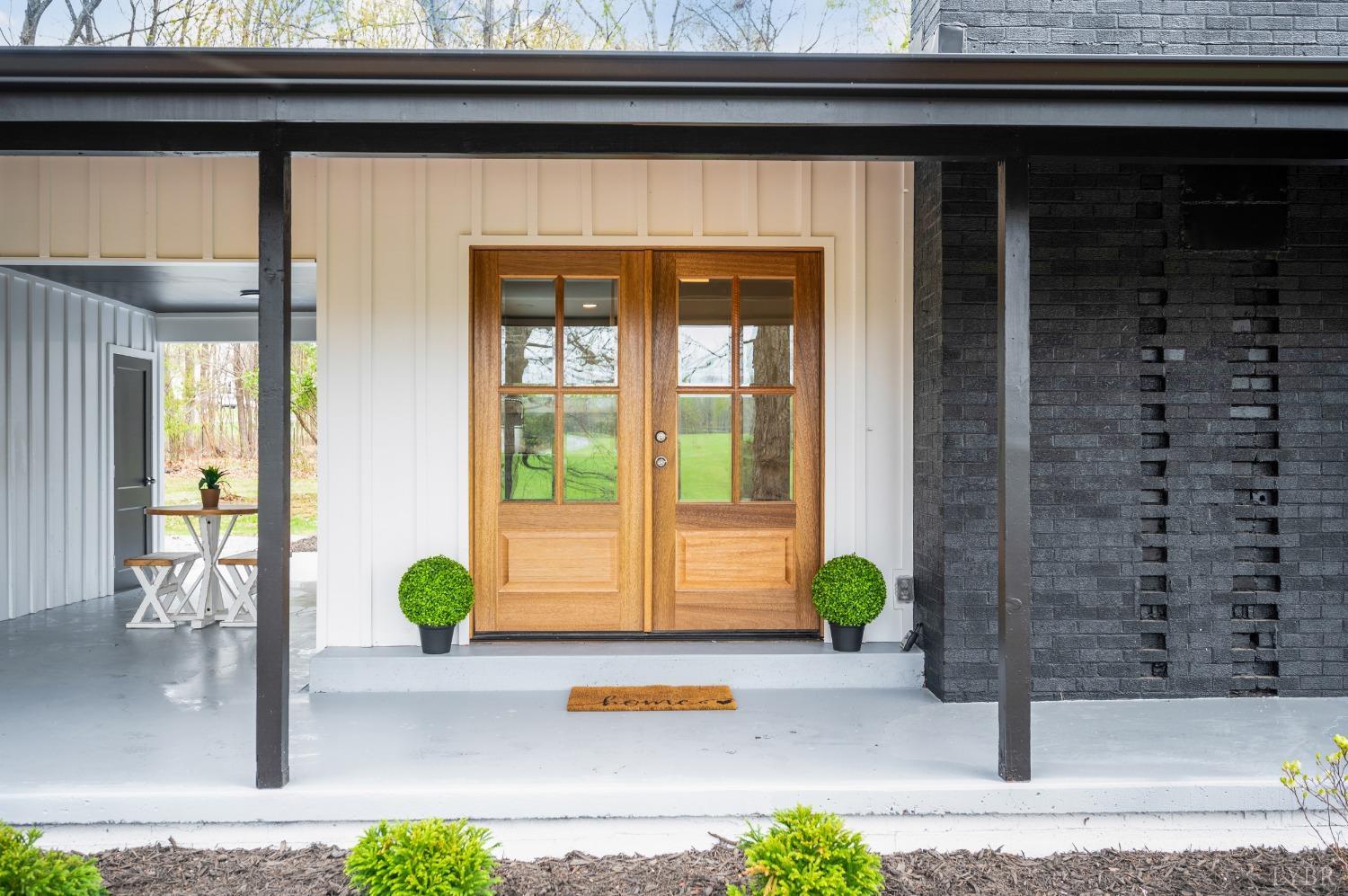 1761 Old Farm Road Lynchburg, VA 24503 - Photo 47 of 60 a front view of a house with a garden