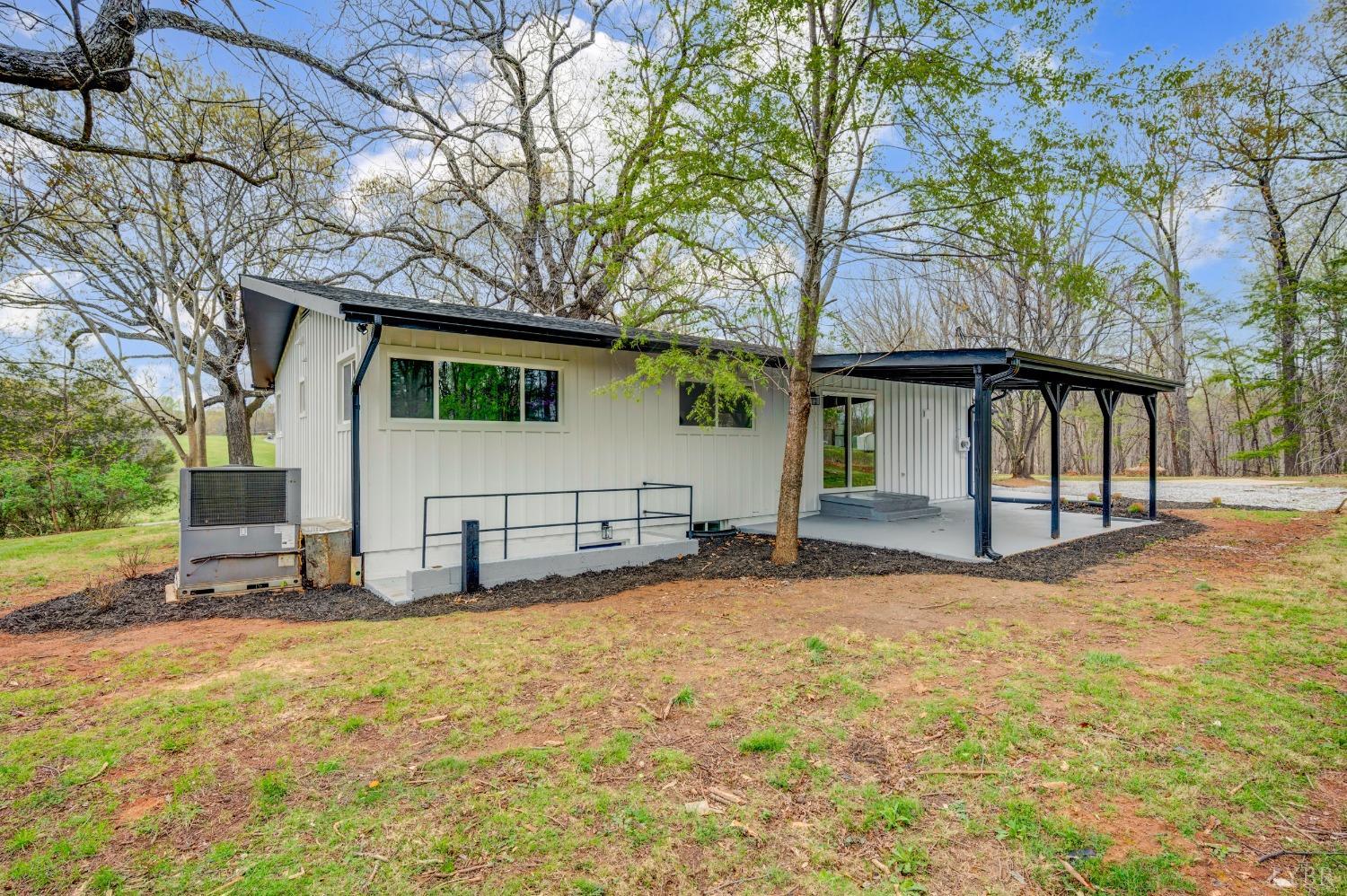 1761 Old Farm Road Lynchburg, VA 24503 - Photo 56 of 60 a view of a house with backyard and sitting area